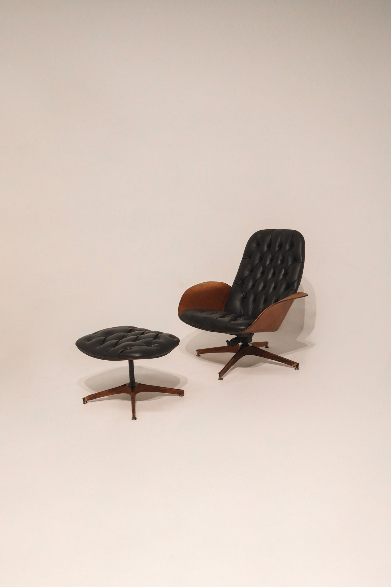 Mid Century Modern Lounge Swivel Chair and Ottoman by George Mulhauser Circa 1960s