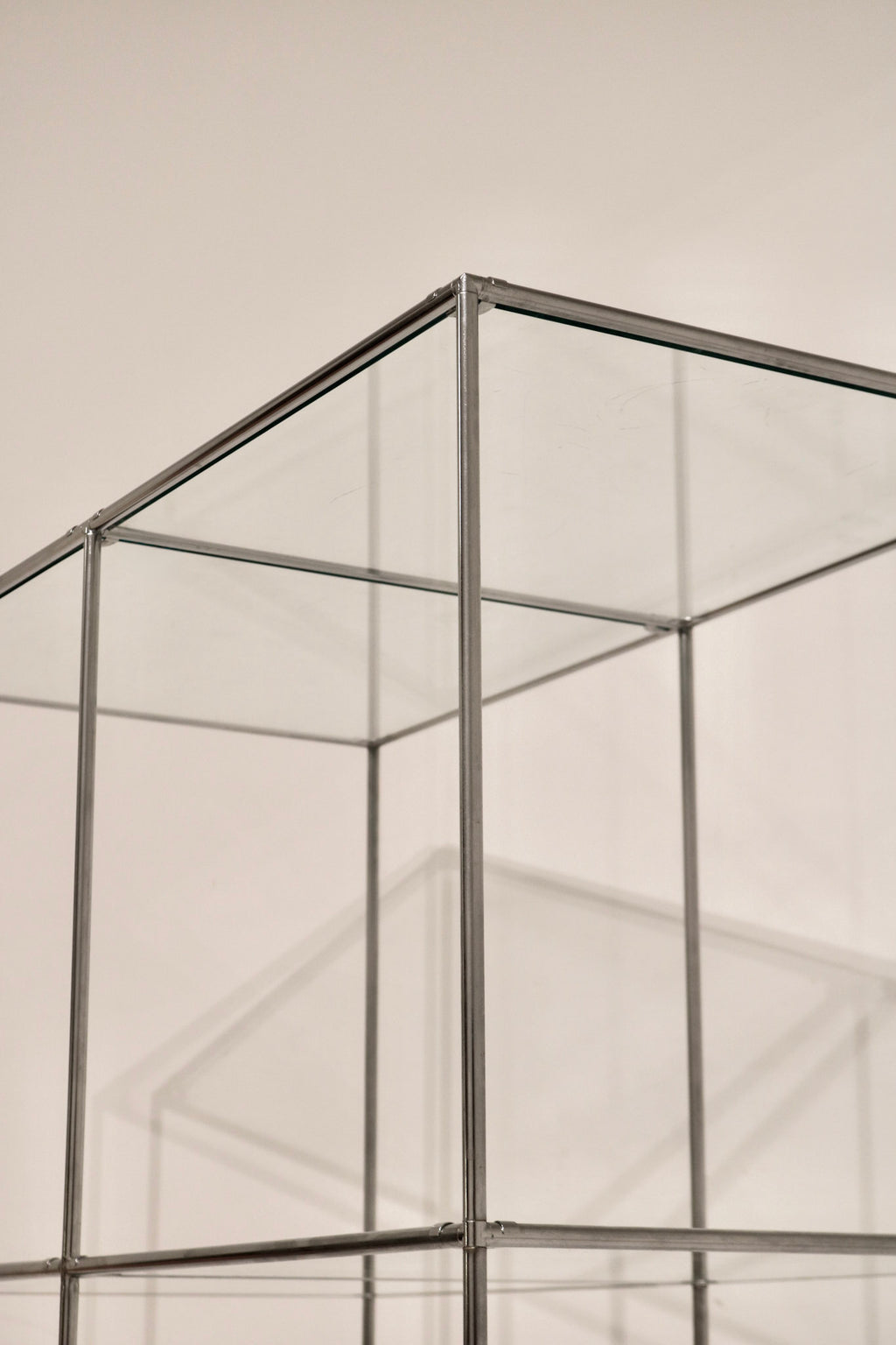 Angled view of the corner showing geometric cube design and transparency