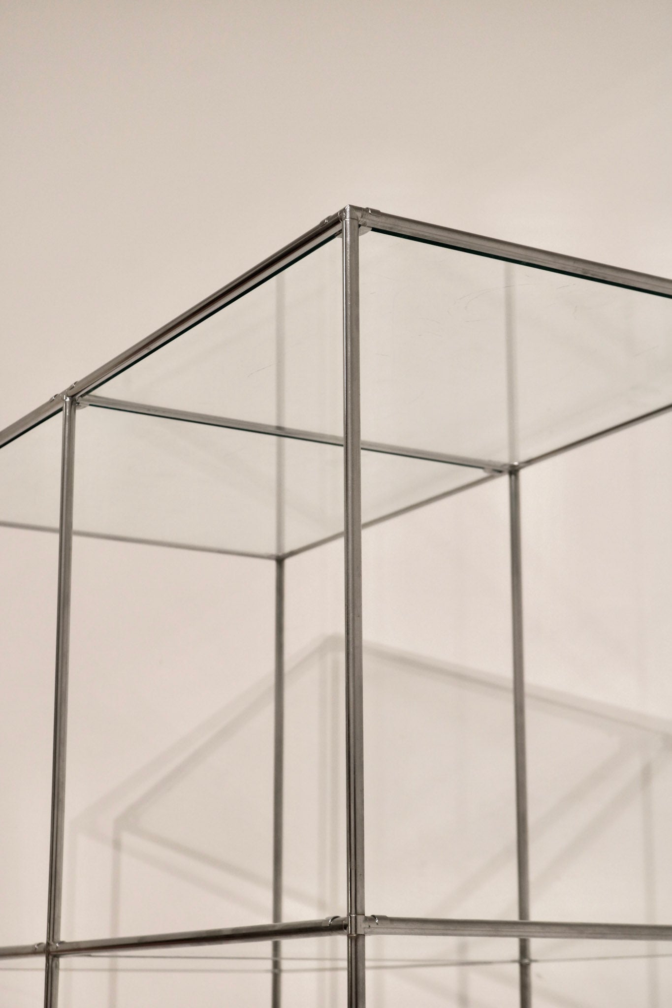 Angled view of the corner showing geometric cube design and transparency
