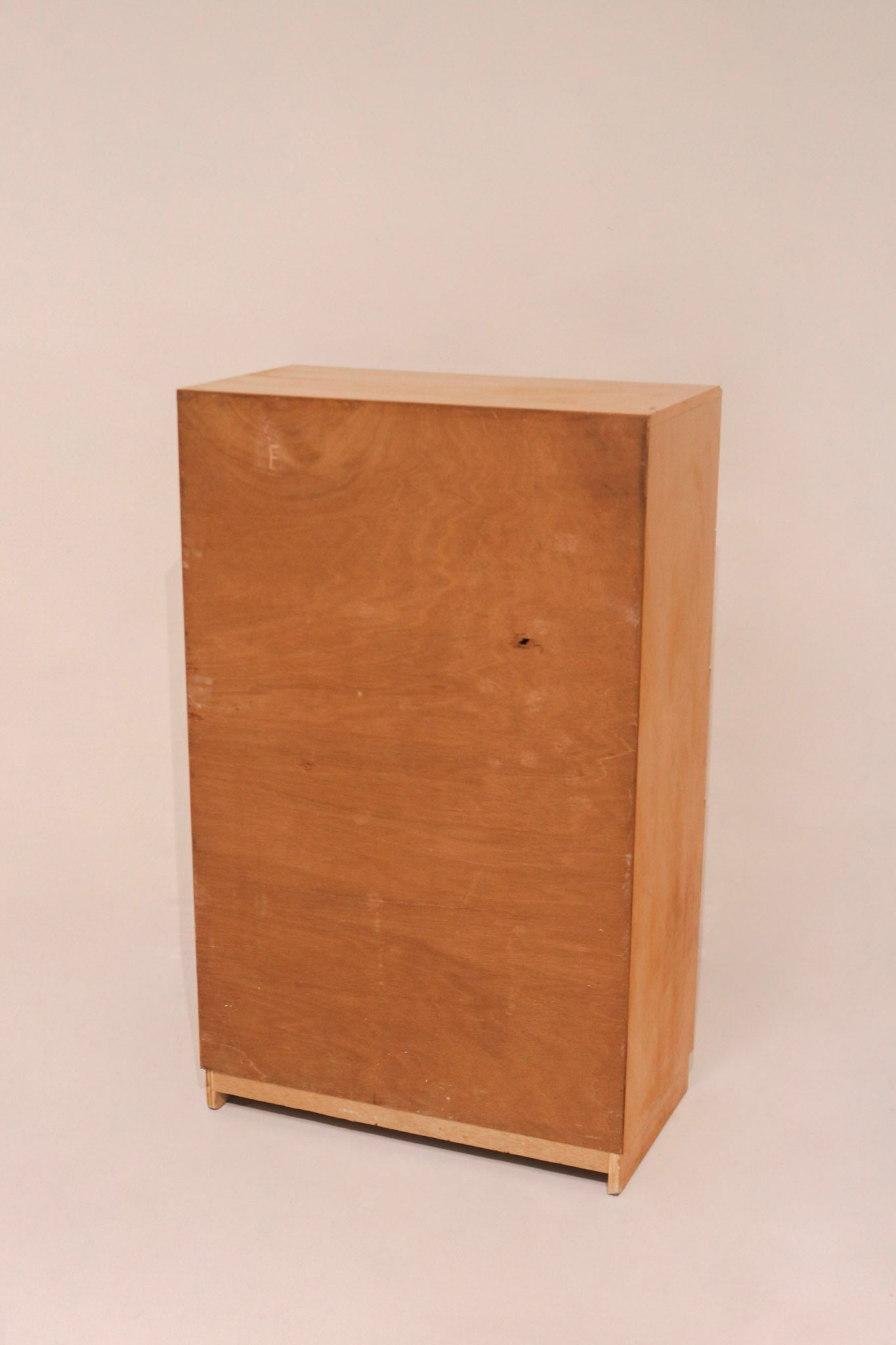 Angled high view showing the dresser's rectangular shape and edges