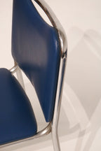 Angled rear view highlighting the minimalist tubular steel design