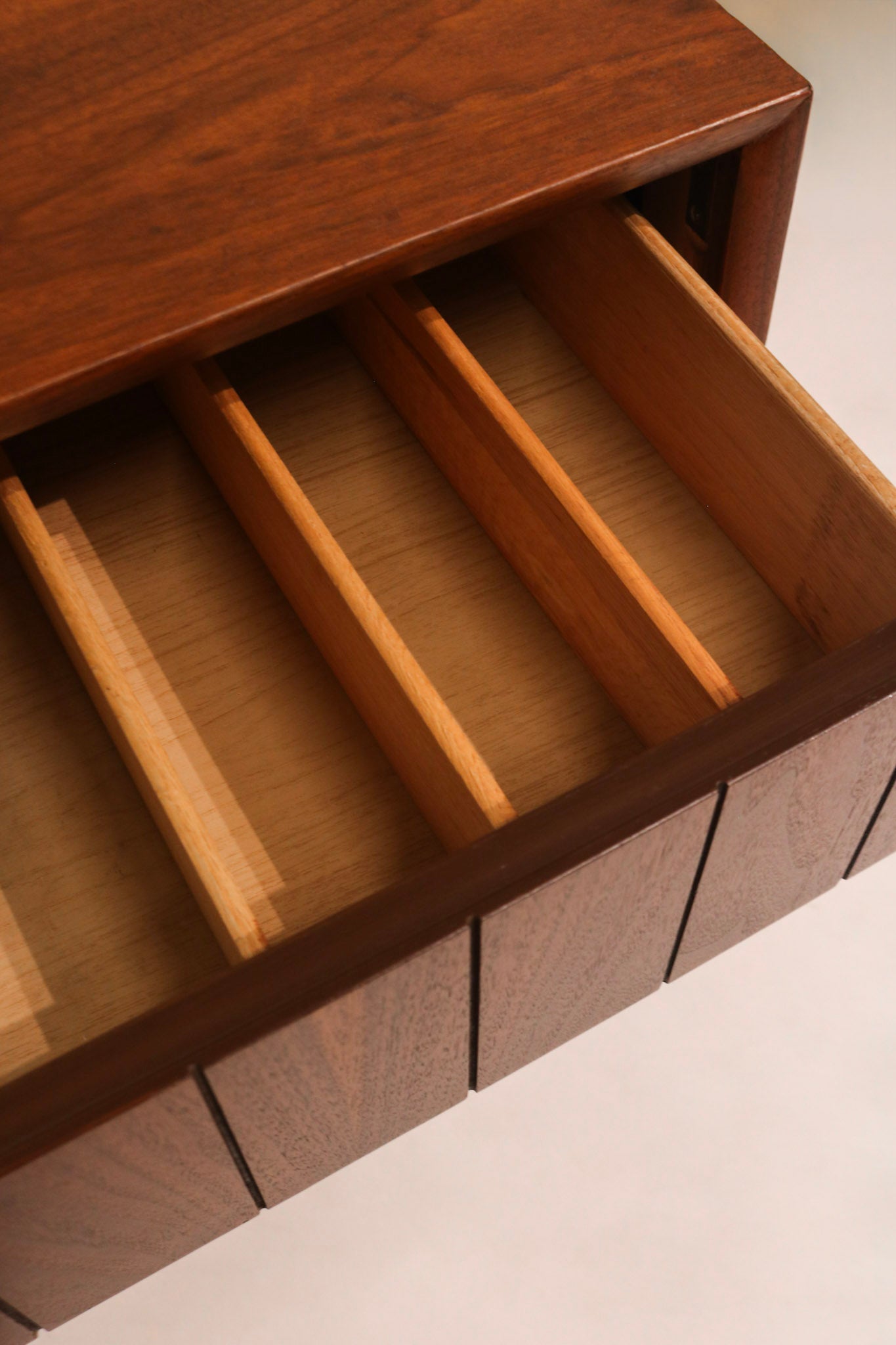 Angled top view of credenza showing vintage condition and design