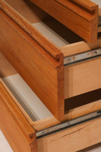Angled top view of nightstand with drawers open showing storage capacity