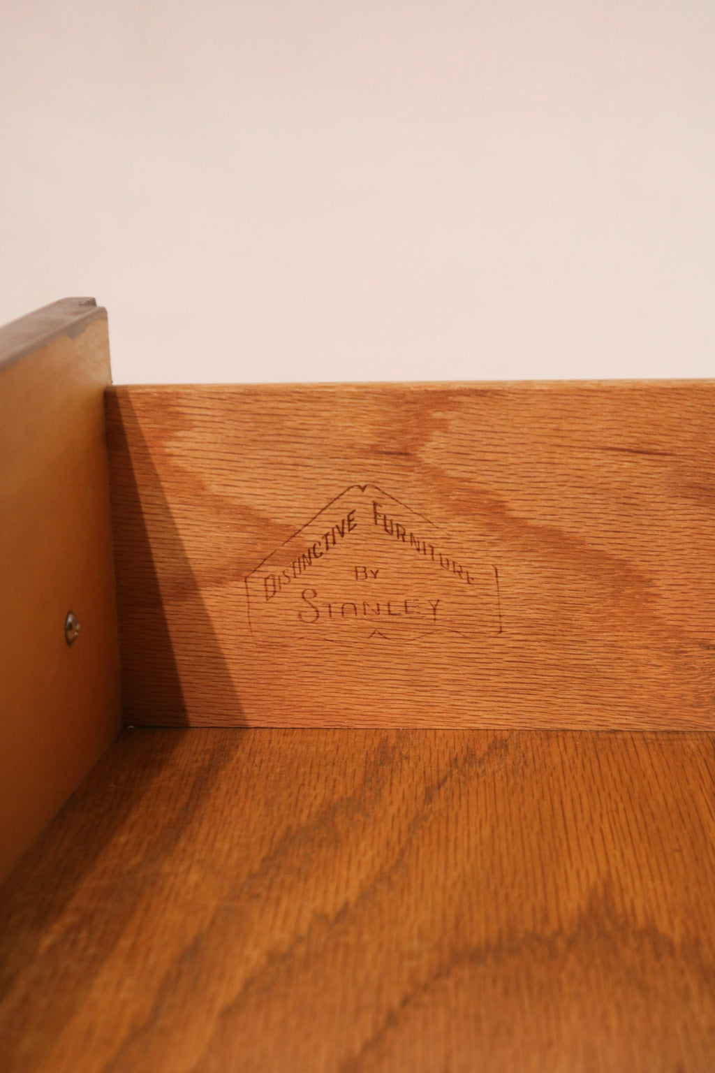 Angled top view showing the dresser surface condition and walnut finish