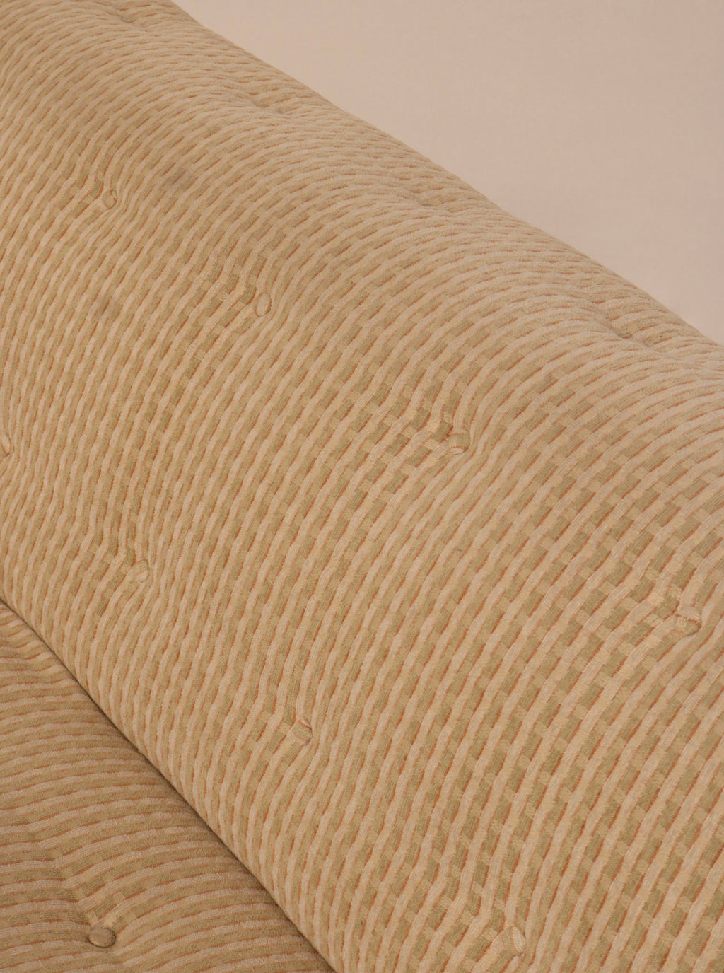 Angled top view showing loveseat profile and armless silhouette