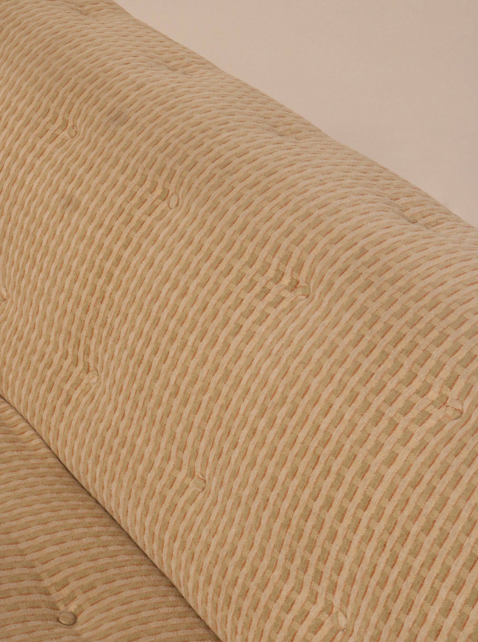 Angled top view showing loveseat profile and armless silhouette