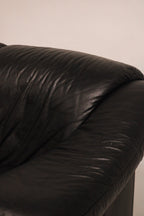 Back angle view showing overall shape and tight fitting upholstery design