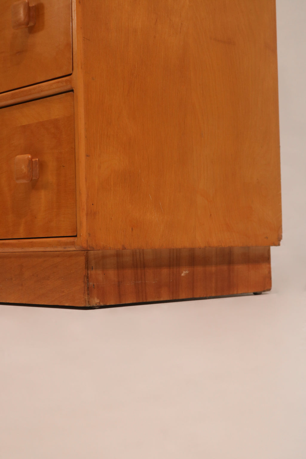 Detail of the base corner plinth showing solid oak construction