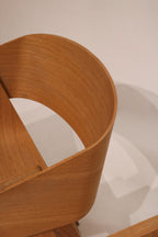 Top view of Berta chair seat showing ash wood grain and finish quality