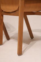 Grouped side angle of set showing consistent shape and wood tones