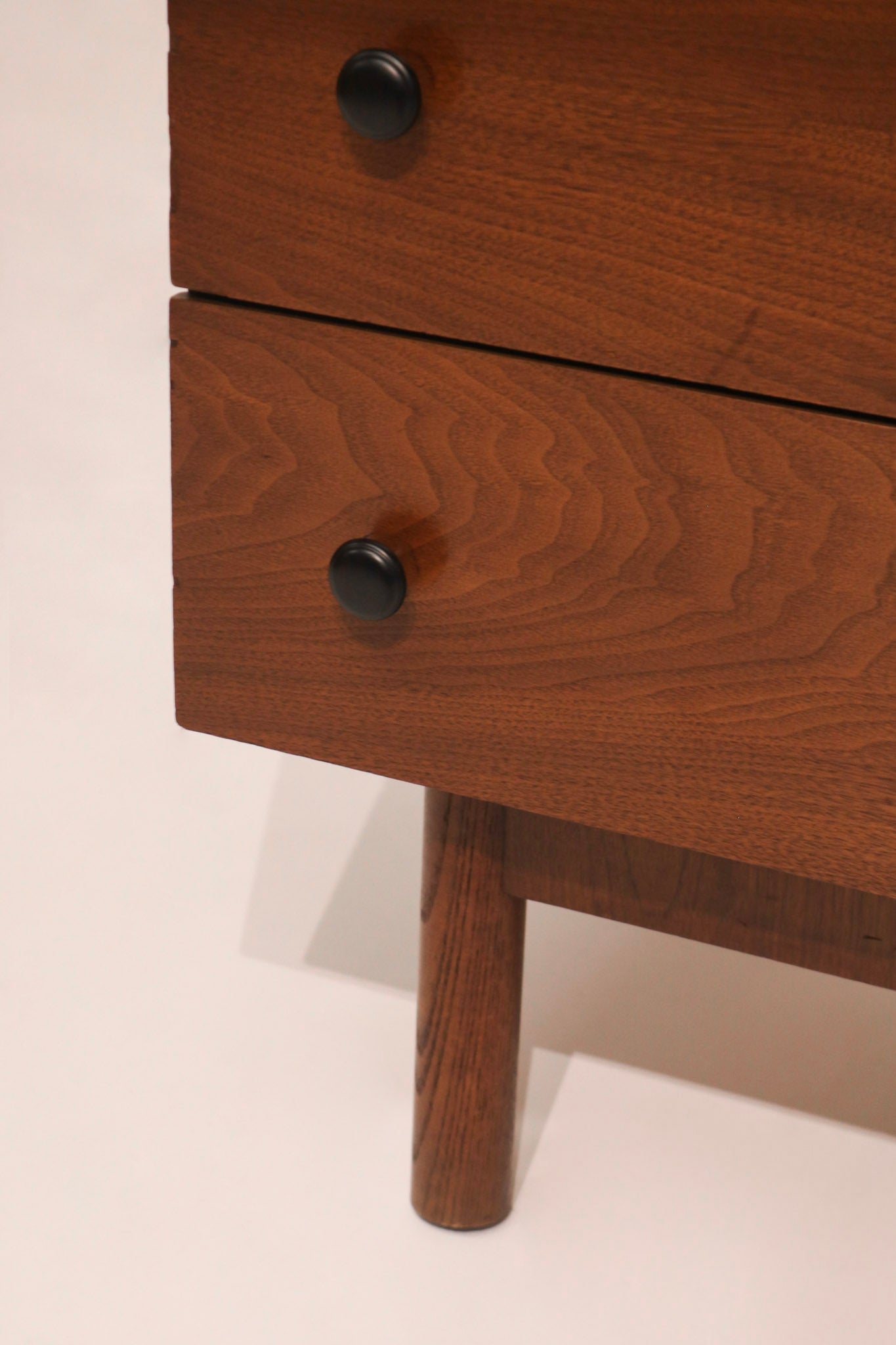 Close-up of the original black metal knob pulls characteristic of Stanley