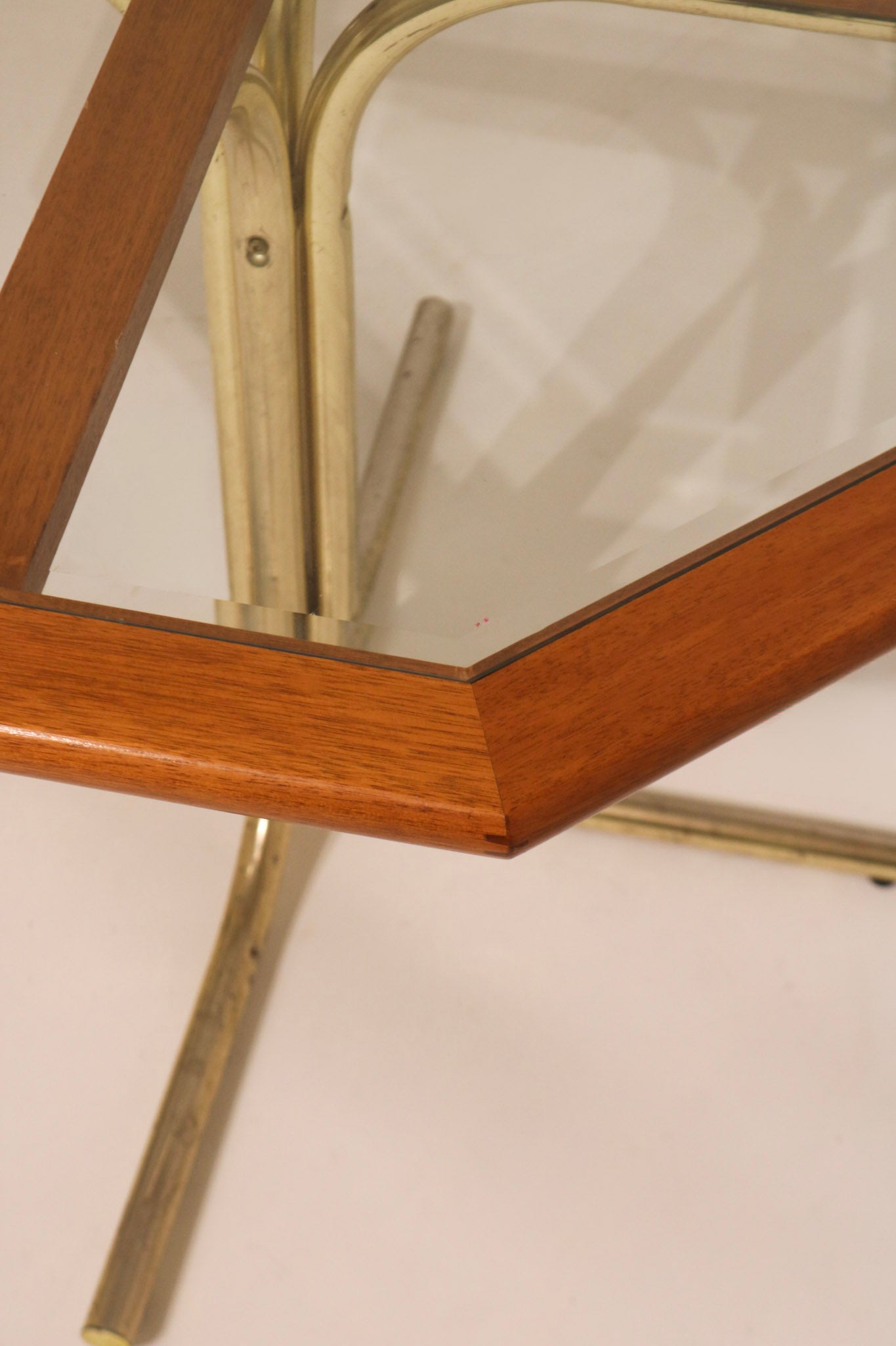 Close-up showing wear on the brass finish of the metal base