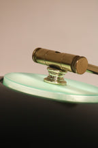 Close-up of the brass knob joint allowing angle adjustment