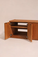 Front view with doors open showing interior storage compartment