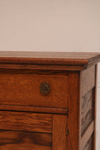 Detail of cabinet doors with recessed panel design in oak