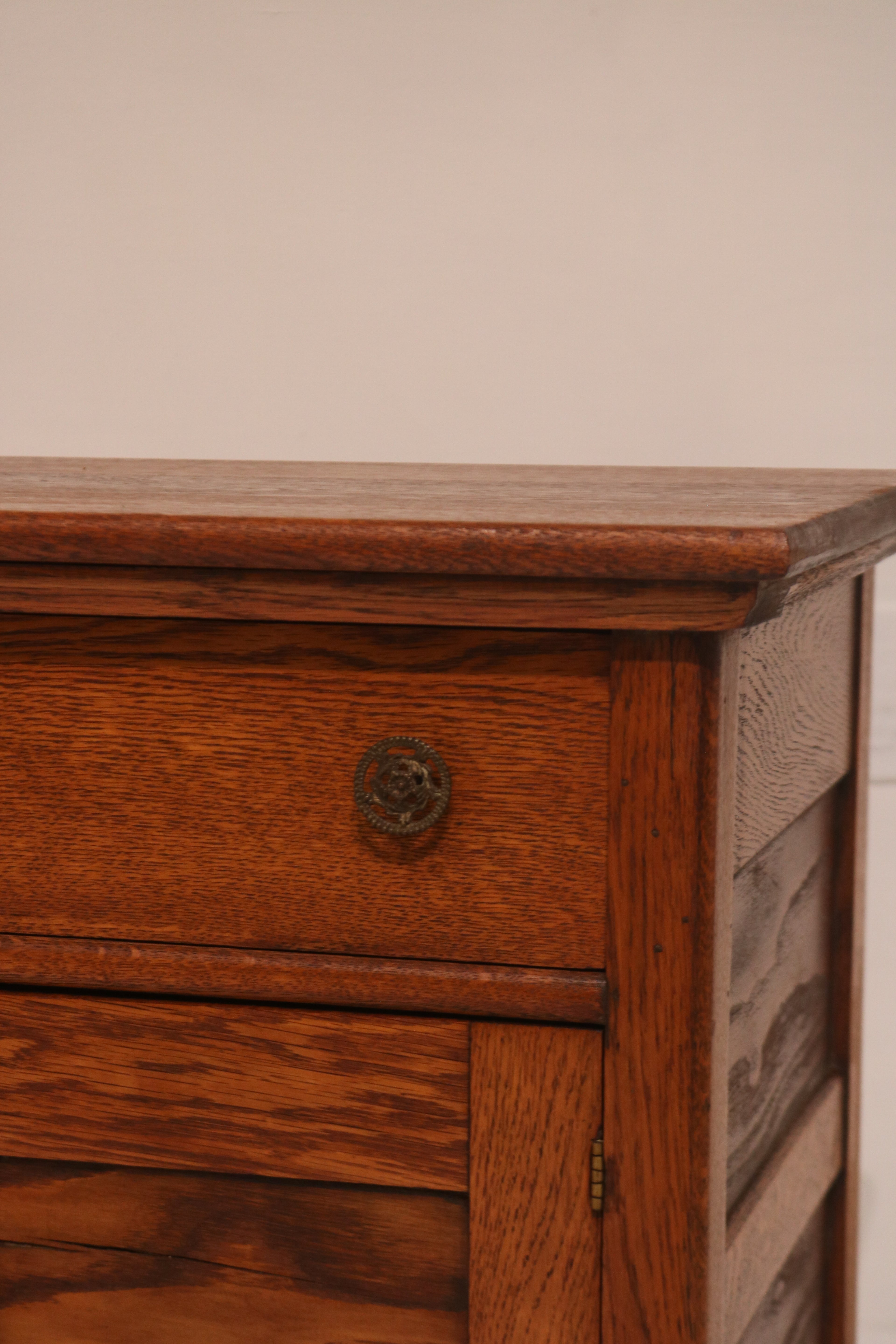 Detail of cabinet doors with recessed panel design in oak
