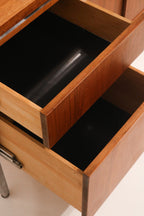 Interior view of the cabinet side showing shelf and storage space