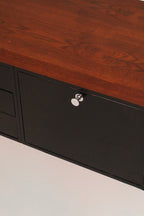 Close-up of chrome cabinet lock mechanism (key status check description)