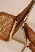 Close-up detail of cane backrest weave and wood frame condition