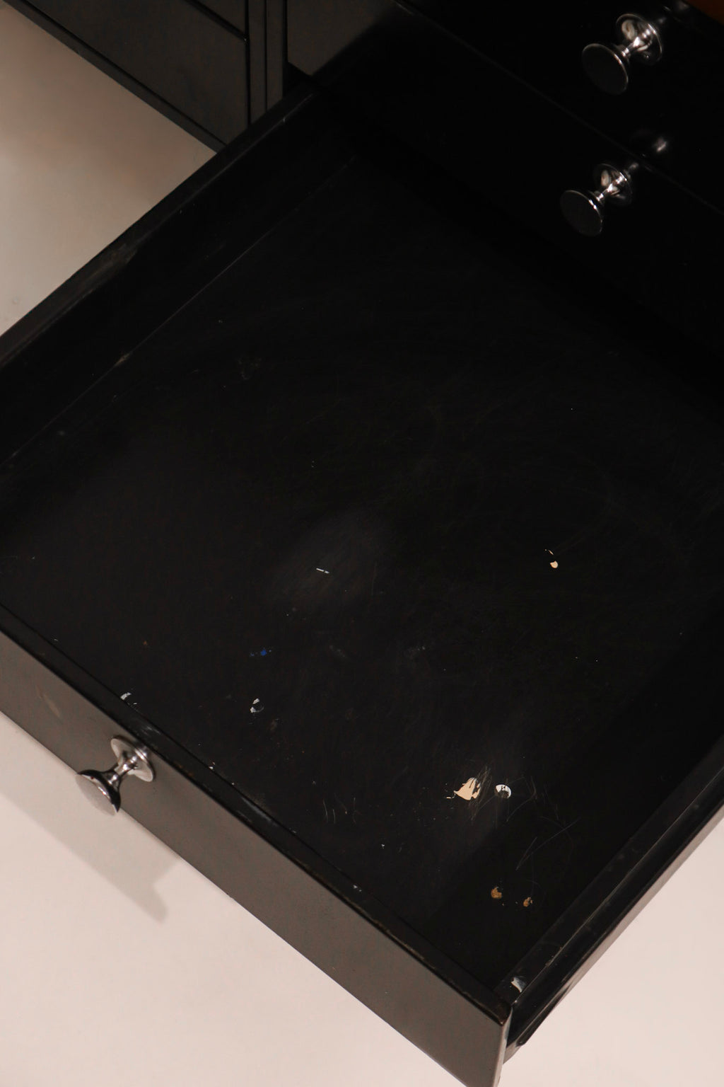 View of central tiered drawers open showing organized storage