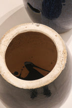 Top surface detail vintage blue ceramic stool with traditional decorative pattern