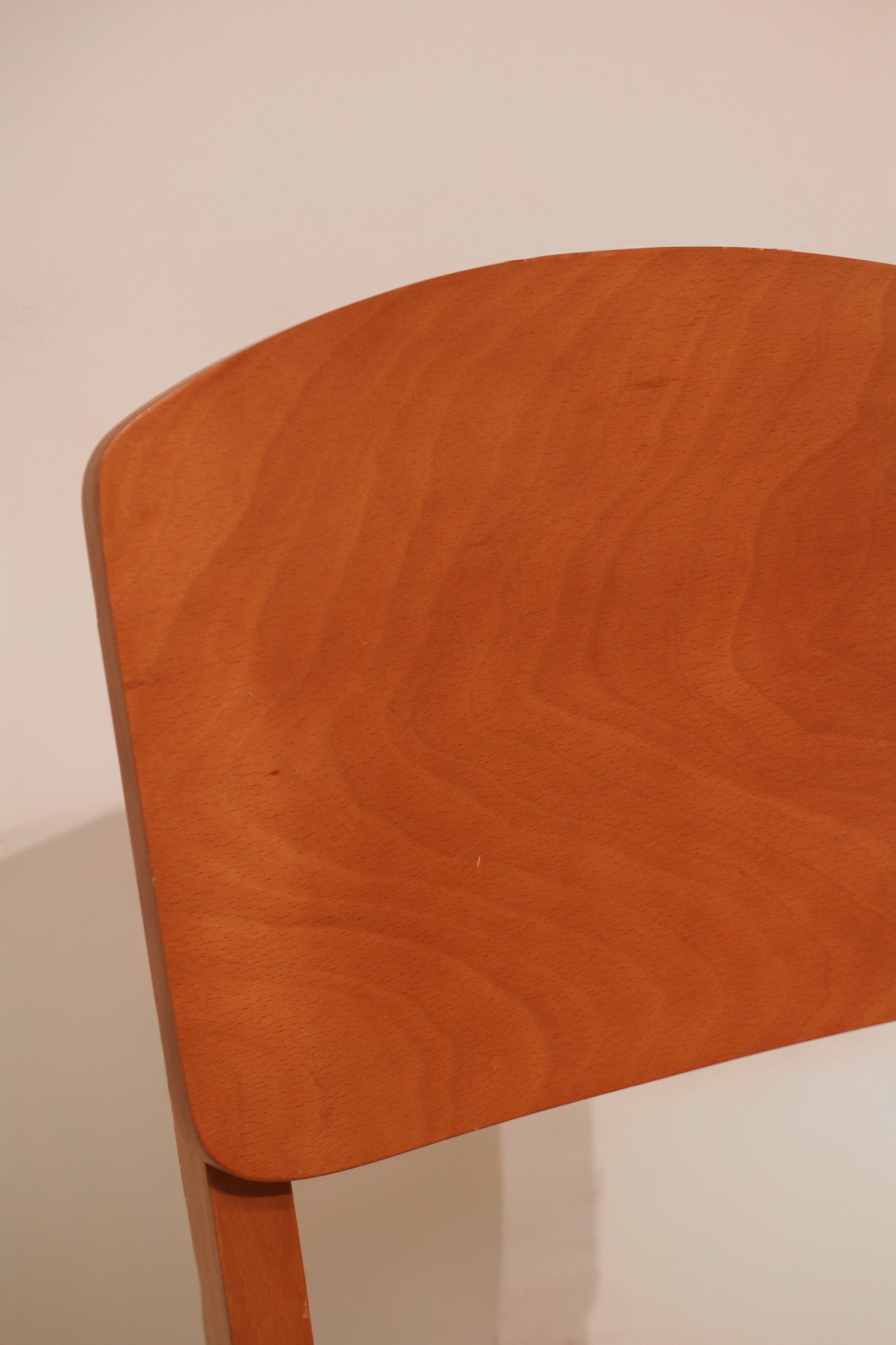 Close-up of chair base joint construction connecting legs and seat