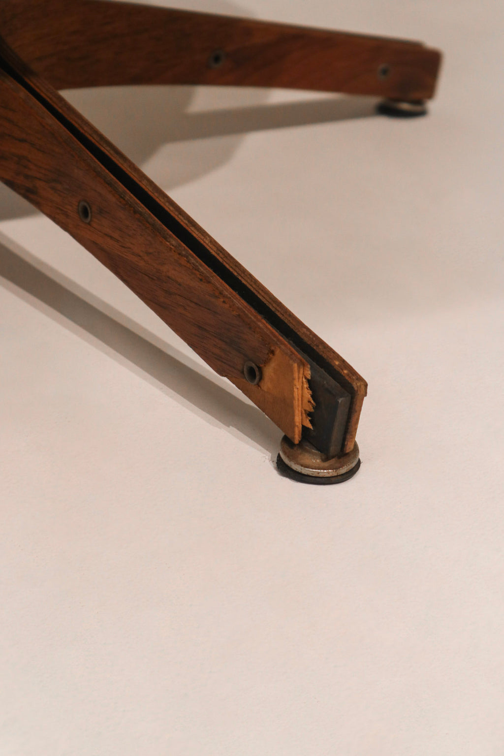 Detailed view of the chair seat cushion tufting and comfort