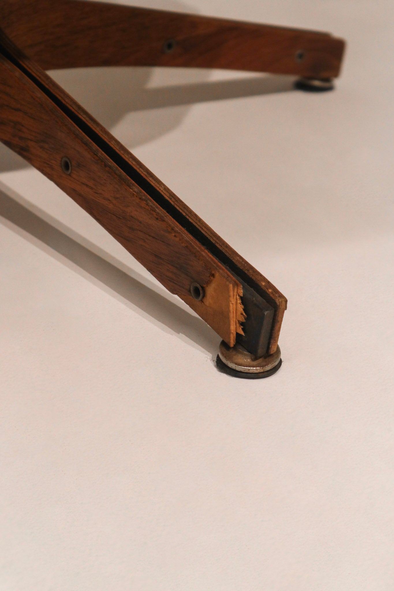 Detailed view of the chair seat cushion tufting and comfort