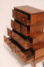 Tiered front view all drawers open showing graduated storage design
