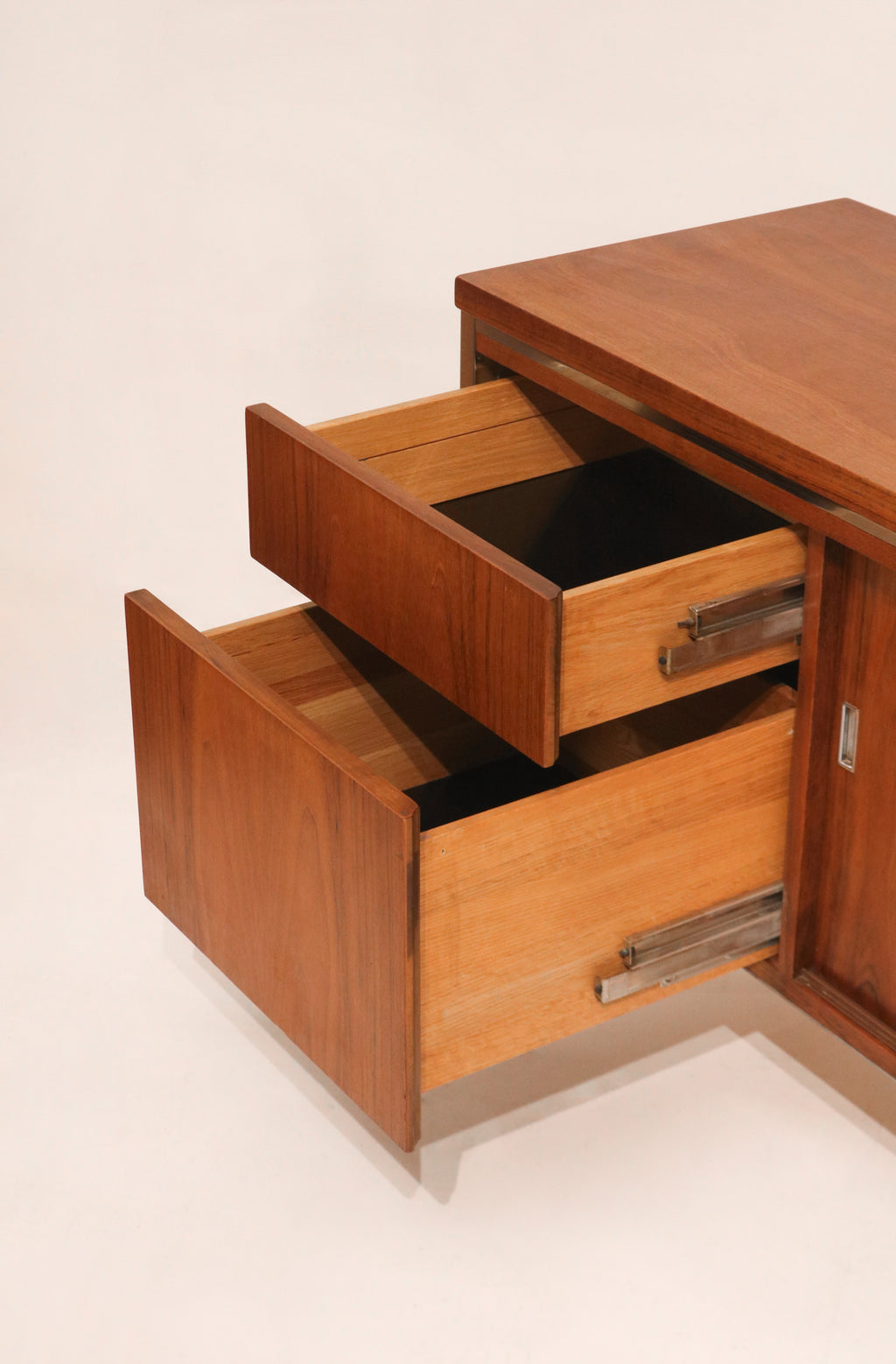 Close-up of the sleek chrome drawer pull hardware