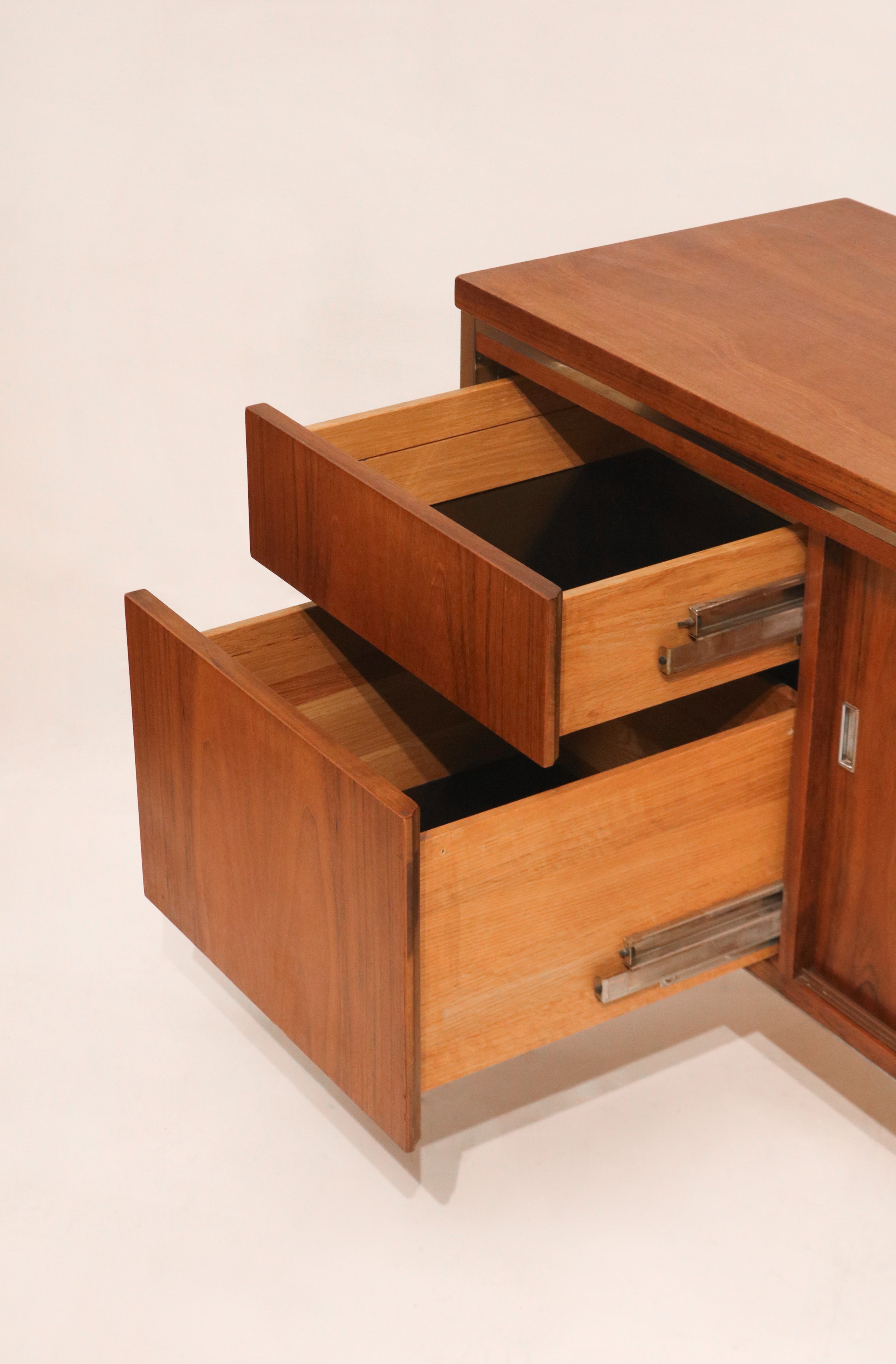 Close-up of the sleek chrome drawer pull hardware