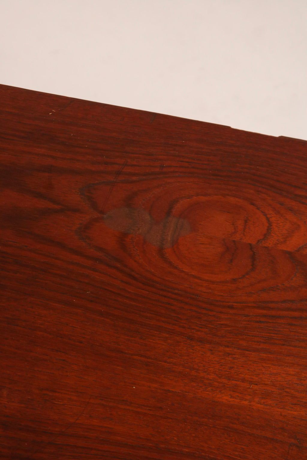 Close-up of chrome steel leg base corner showing industrial style