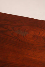 Close-up of chrome steel leg base corner showing industrial style