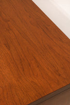 Close-up of wear and missing wood detail on the right corner edge