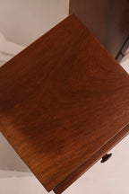 Close-up of the corner edge showing solid wood condition and color