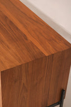 Close-up of the corner edge showing the junction between wood and steel