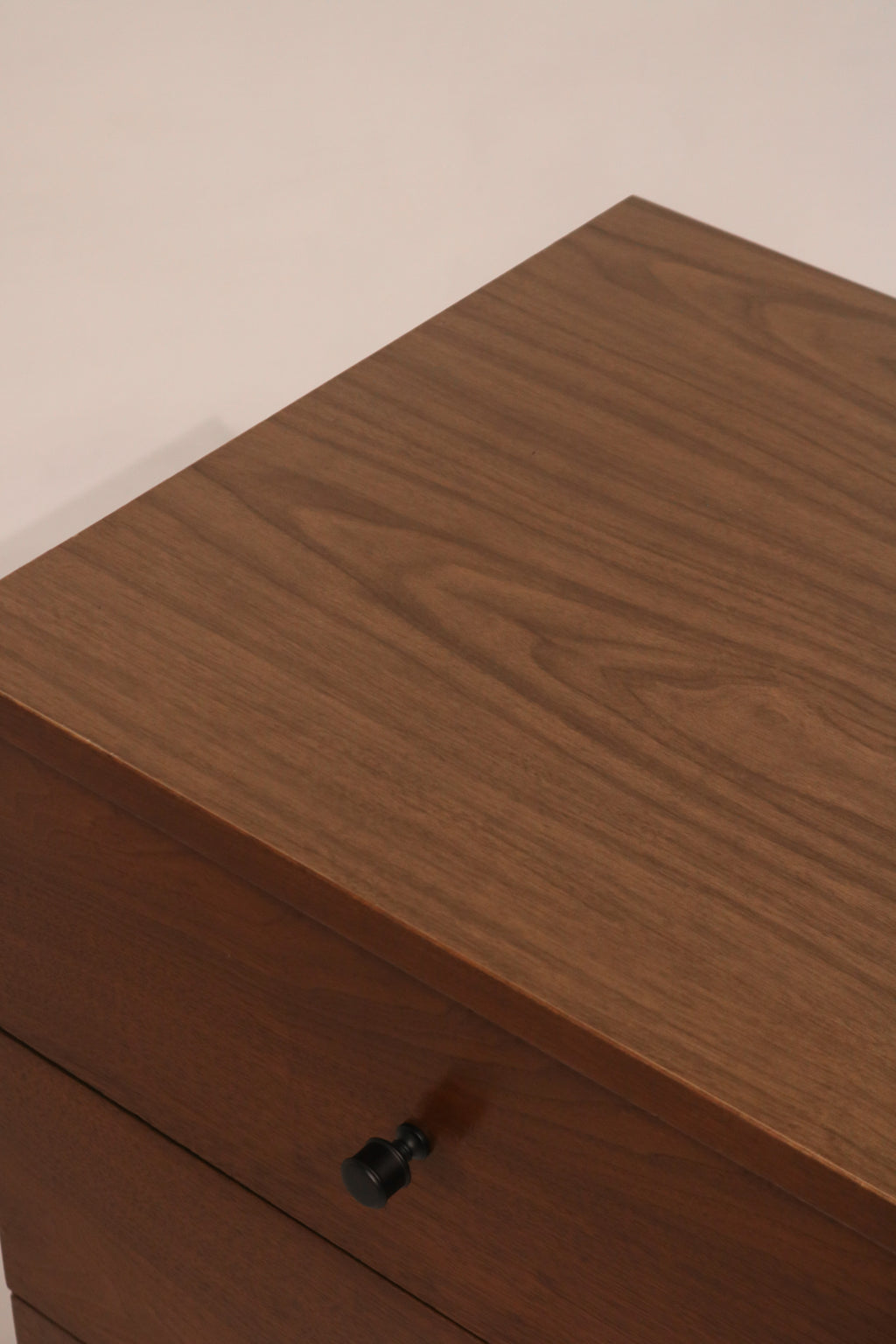 Close-up of desktop corner edge showing finish condition
