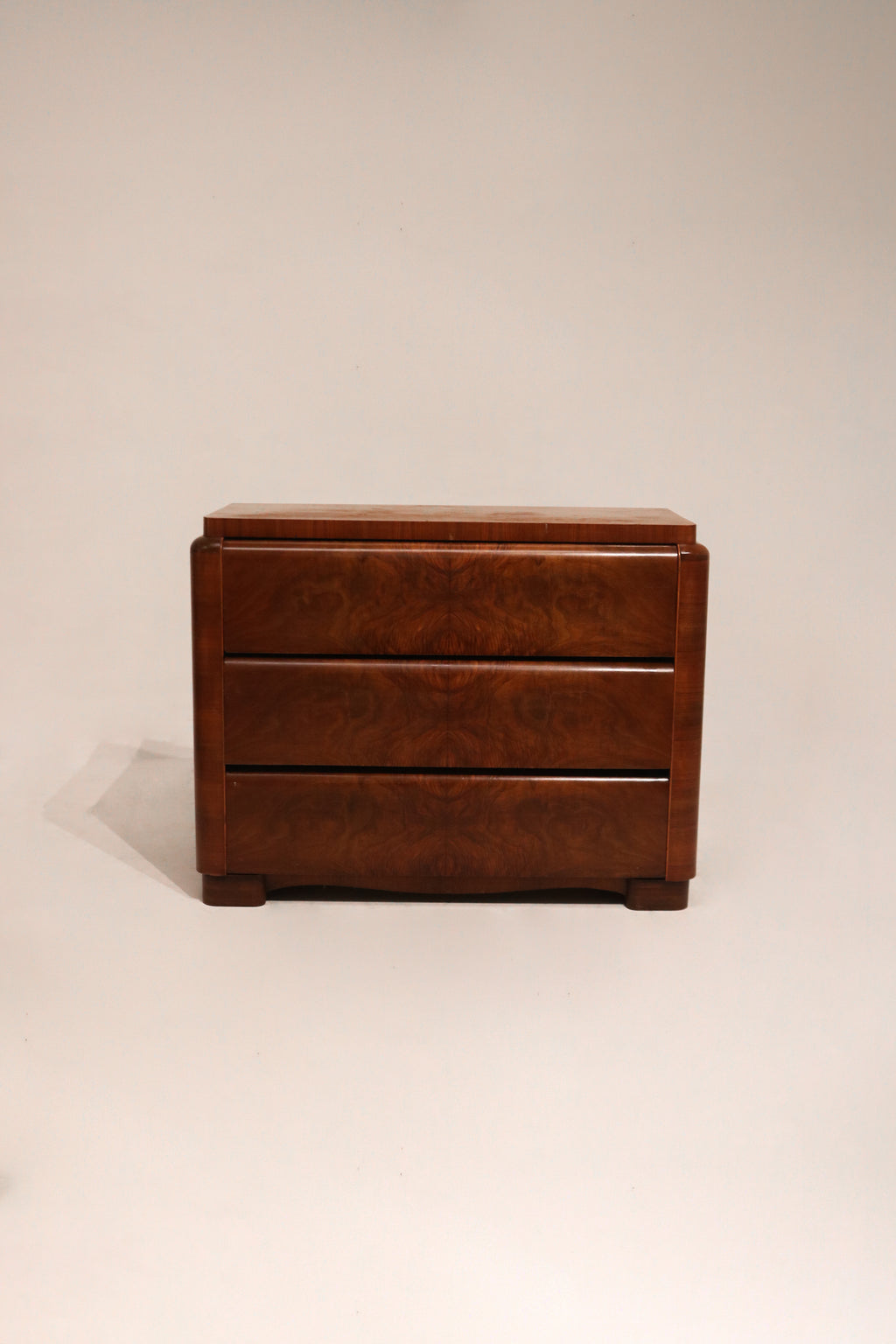 Front full view of Art Deco vintage burlwood dresser chest with three drawers in wood finish