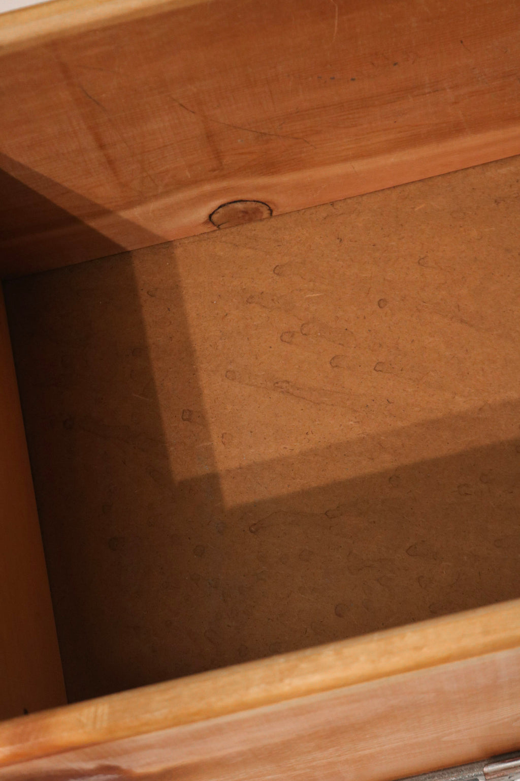 Detail of oak wood grain pattern that adds to the vintage character of the desk