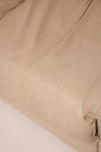 Side view of vintage Salotti Natuzzi sofa showing armrest design and leather quality