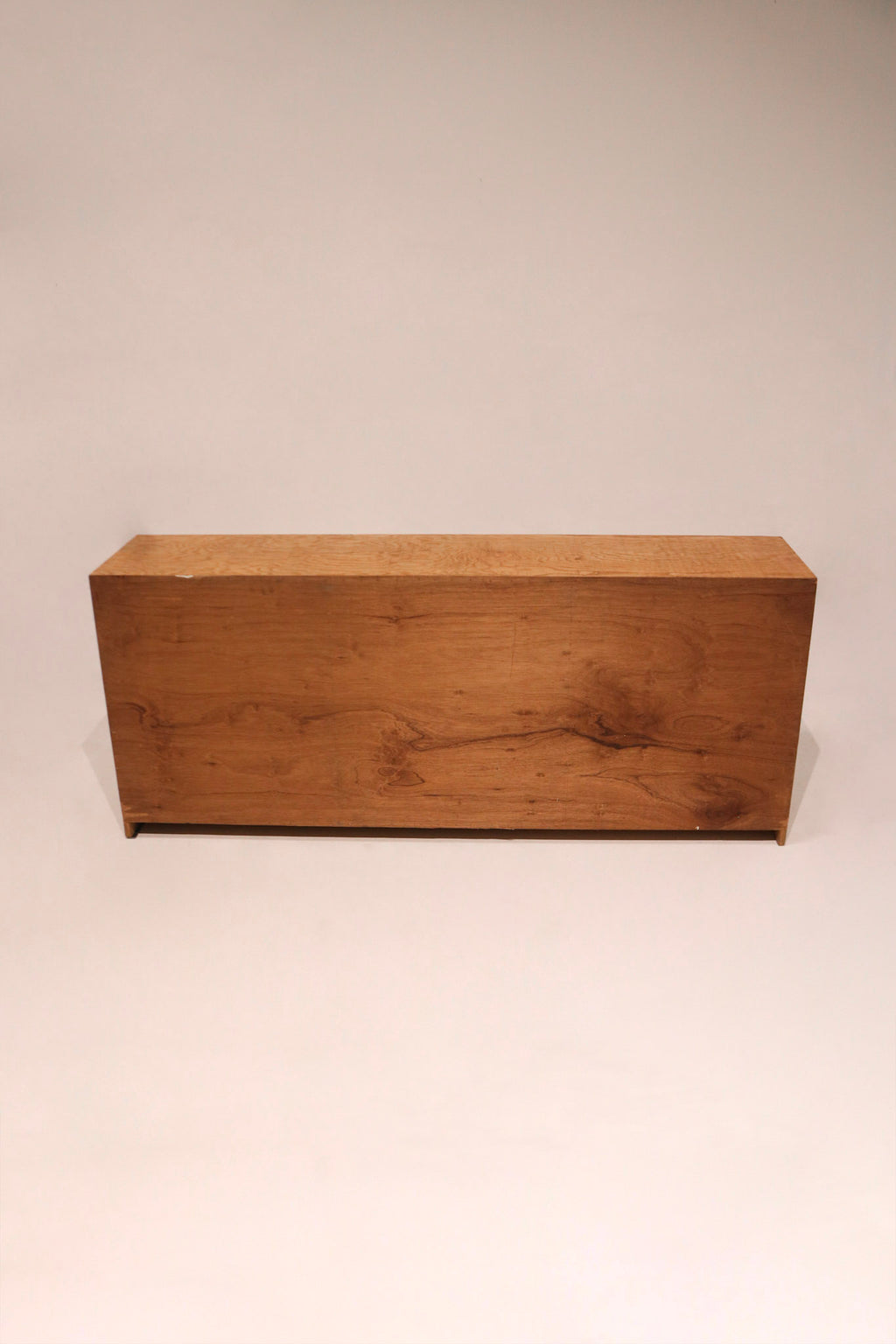 Close-up of oak wood texture showcasing warm finish and minor natural imperfections