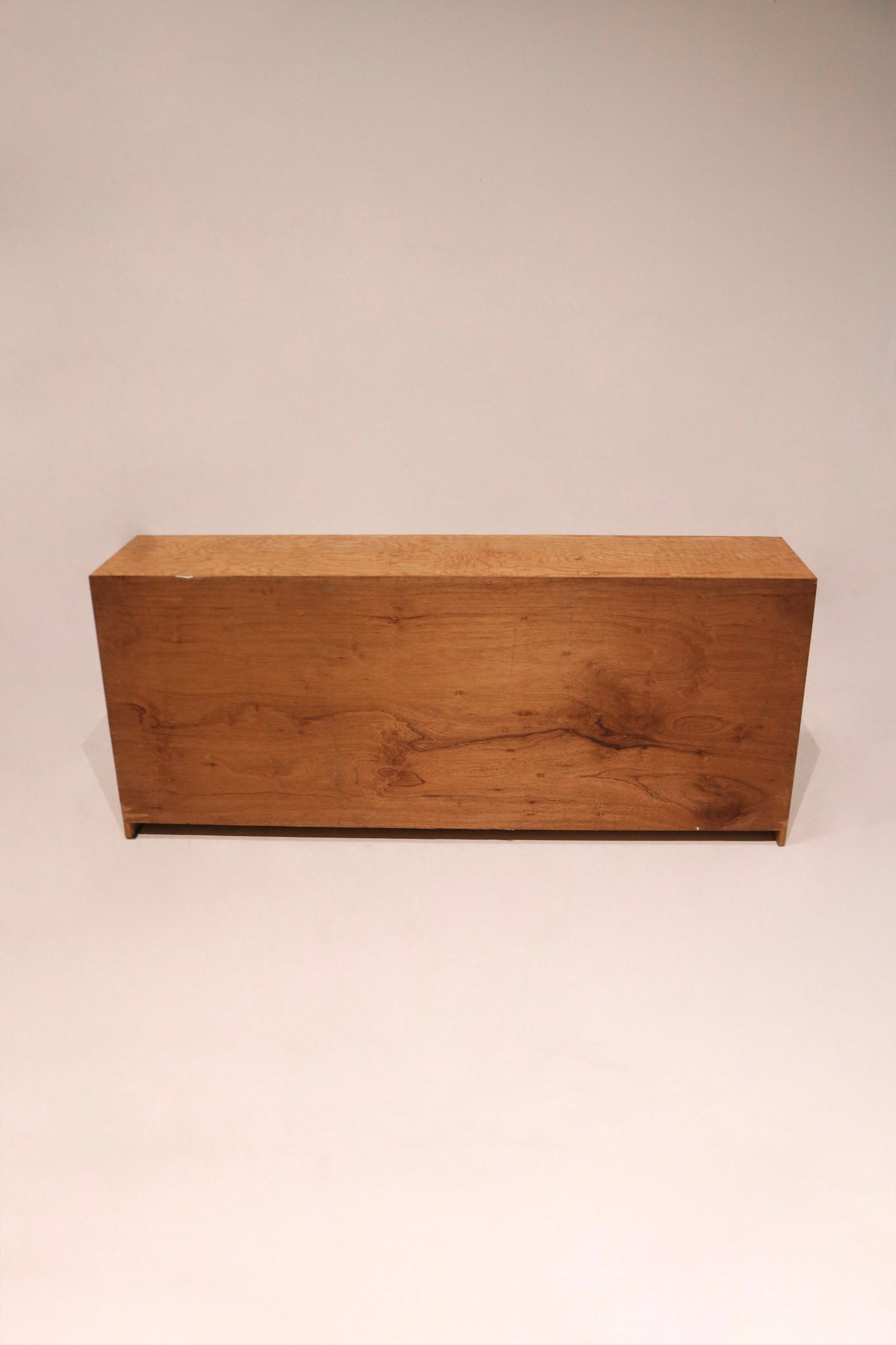 Close-up of oak wood texture showcasing warm finish and minor natural imperfections