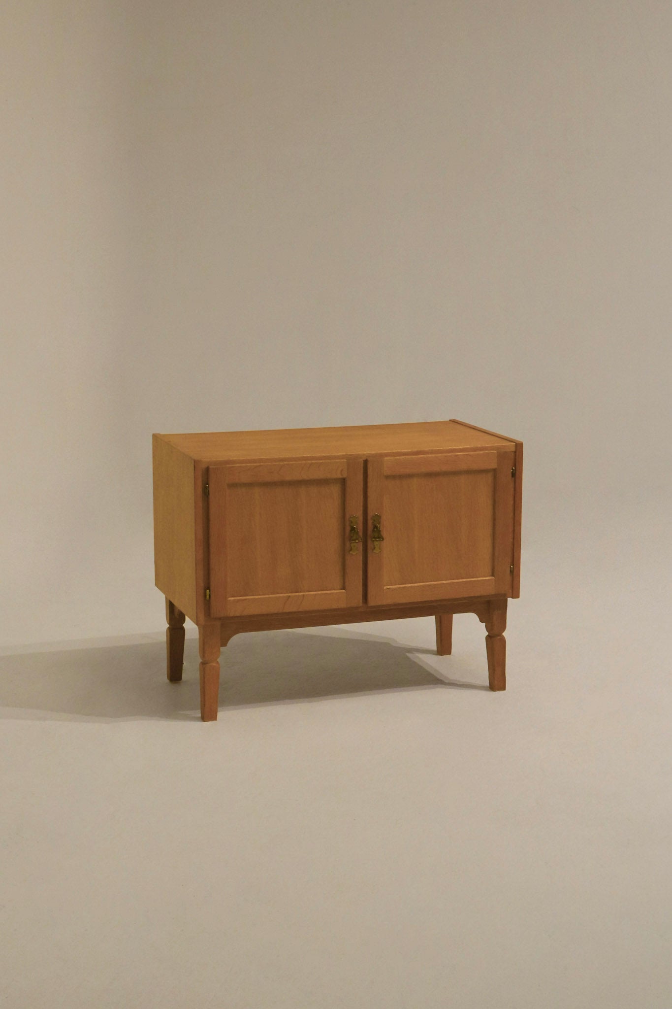 Vintage Danish oak wood piece with brass hardware