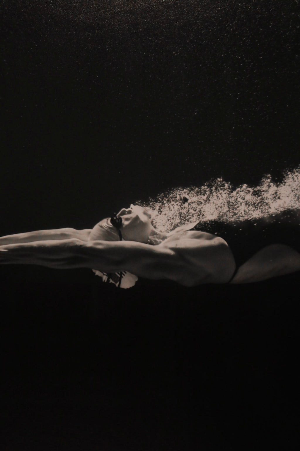 Edge close-up showcasing frame finish and minimal wear on black wood material