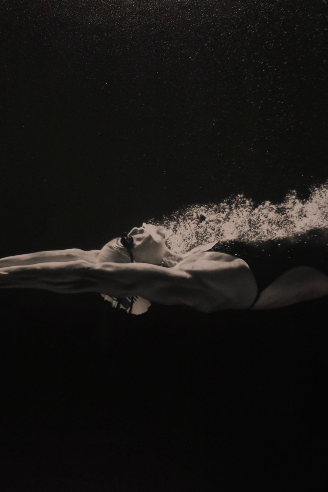 Edge close-up showcasing frame finish and minimal wear on black wood material