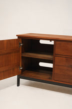 Base detail with focus on iron leg construction and connection to frame