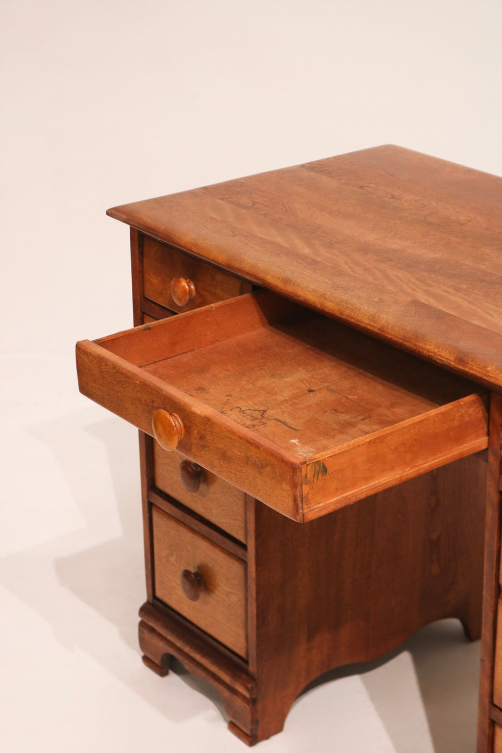 Detailed texture of the desktop corner in maple wood handcrafted circa 1950