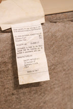 Close-up of genuine Italian leather upholstery texture on Salotti Natuzzi sofa in beige color