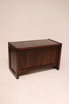 Detailed edge view of the desk top showing refined oak wood stain and texture