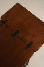 Detail: interior compartment where sewing machine likely sat, walnut wood cavity with original joinery and storage space